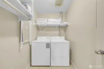 Spacious utility room with a full-size washer/dryer—laundry made easy!