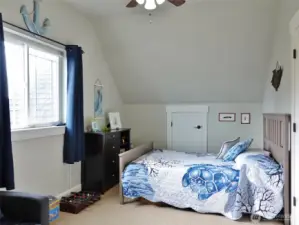 Upstairs 2nd Bedroom w/ side storage closet.