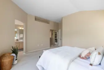 Another view through the master suite, with bathroom and walk-in closet doors.
