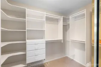 HUGE walk-in closet with all the cabinetry you'll need!