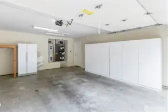 This fully-finished two-car garage has tons of built-in storage!