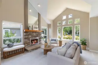 This spacious gathering room with soaring ceilings is the perfect place to entertain.