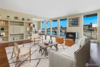 Huge picture windows capture expansive Sound and Mountain Views.