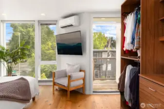 3rd floor primary bedroom.  Door to balcony.