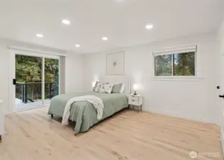 Primary suite with deck access.