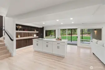 Downstairs wetbar offers an easy kitchenette conversion option.