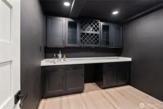 2nd hidden room with wine storage and a large beverage fridge. Elevate your entertaining game!