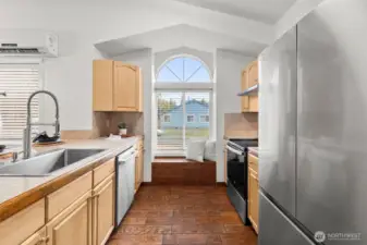 Brand new appliances and updated counters in this stunning kitchen!