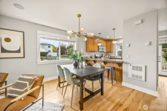 Spacious dining room with easy access to kitchen for entertaining.
