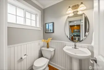 Delightful half bath located on main floor.