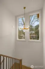 Gorgeous gold luxe lighting fixtures throughout.