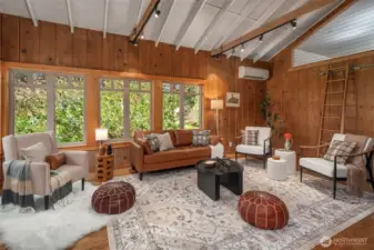 There's a sweet loft space accessed via the library ladder and a ductless mini split system for year-round comfort.