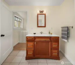 Primary bath vanity. Bedroom is through doorway.