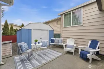 virtually staged patio area and storage shed