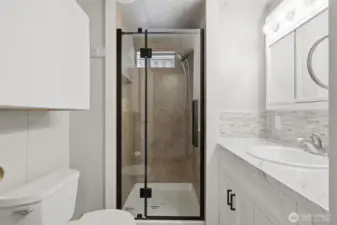 3/4 bath with new vanity and shower