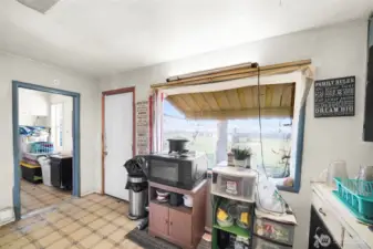 Back door access to backyard from kitchen.