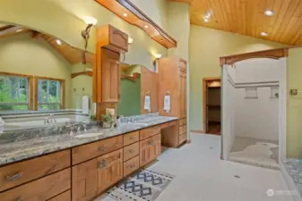 This amazing and spacious primary bath has heated tile floors and the shower is a work of art, with dual heads and controls.