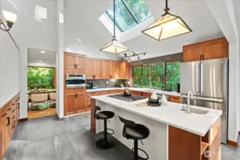 Gorgeous kitchen that radiates with natural light from the oversized windows and skylights