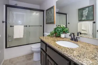 Full size guest bathroom.