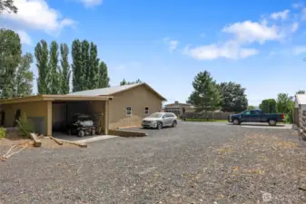 60X60 outbuilding on separate meter with drive though equipment storage.