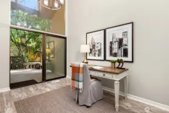 Formal dining area, currently staged as an office.