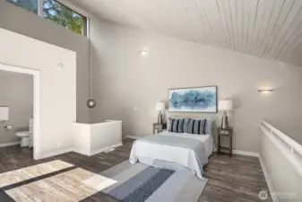 Upper level loft can be used as a bedroom, den or simply flex space.