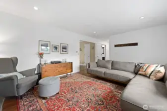 There is a large closet just off the living room. Plus at the end of the hall is a huge closet with coat hanging bar.
