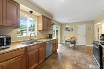 Plenty of cupboard and counter space. Plus, that door is a HUGE pantry.