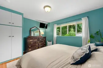 There are TWO sets of closets (one not pictured). Attached TV here stays.