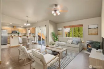 Open great room to kitchen with pellet stove for efficient heating! (virtual staging)