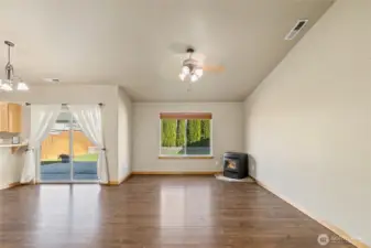 Vaulted ceilings and very well kept laminate flooring.