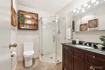 Updated main bath serving two additional bedrooms. Fresh and functional!