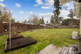 Garden beds with established asparagus and raspberries plus new AC installed in 2023.