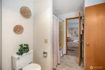 Large, bright bathroom with full tub & 3/4 shower