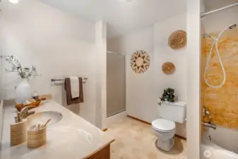 Large, bright bathroom with full tub & 3/4 shower