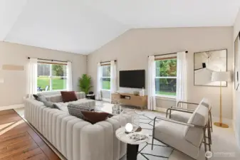 Open Living Room with vaulted ceilings - Virtually staged