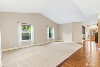 Vaulted ceilings, natural light, open to kitchen and dining room