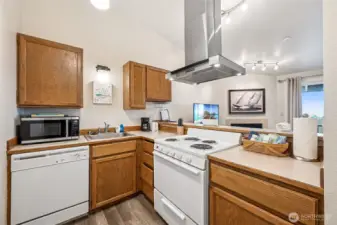 Galley-like kitchen with all major appliances......