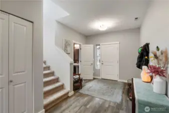 Front entry with powder bath and storage closet