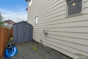 Side yard with a shed