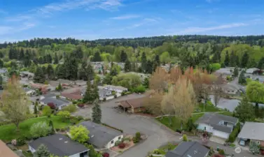 Wandering Creek Community Common area:  Drone view of the clubhouse and reflection lake.