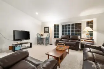 Living room with bay window.  Photos were taken after dark!