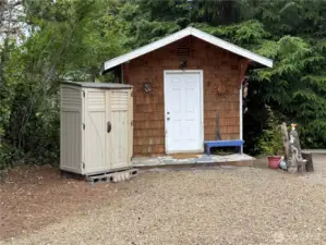 Shed has power and additional storage shed.