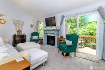 Decompress in front of the warm inviting fireplace