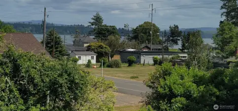 Take in views of Willapa Bay from nearly every angle—whether you're relaxing on the sun-drenched deck, unwinding in the bay-facing living room, or waking up in the upper-level guest suite. This Nahcotta home perfectly frames the coastal landscape, offering ever-changing skies and tranquil water vistas that bring the Pacific Northwest into everyday life.