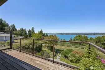 Stunning views of Henderson Bay and the Olympic mountain range from the Primary bedroom.