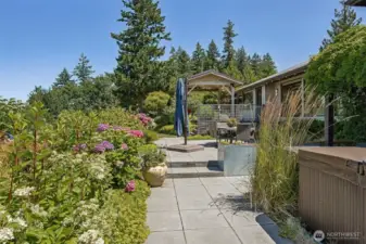 Beautifully landscaped patio area, perfect for outdoor relaxing or entertaining.