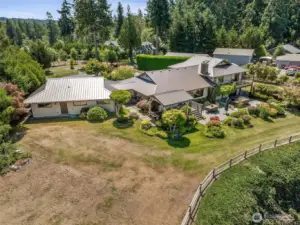 The property also features an 875 square foot, detached 3 car garage with access to the home via a breezeway.