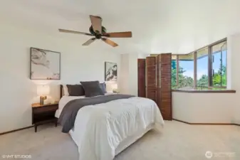 Primary Bedroom w/ Peek-a-Boo Views of Lake Washington in the Fall & Winter