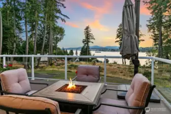 Can you think of a better way to end your day?  This is a great gathering place with a gas firepit and gas hookup to the BBQ! Accessed from the Dining Room and the Primary Bedroom. The railing has lighting installed for a nice ambiance.